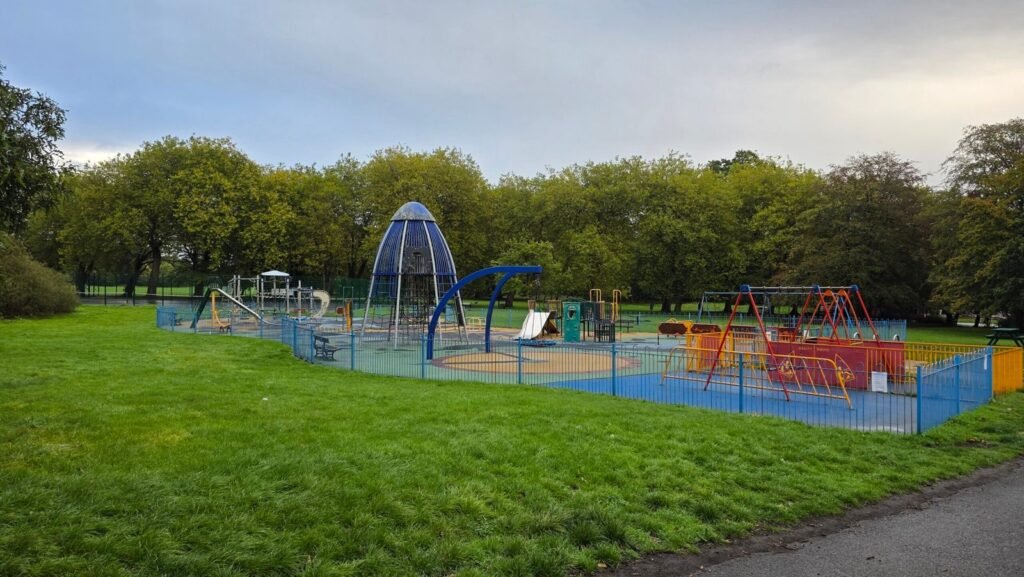 Sefton Park Playground seen from the park path, Aigburth, Liverpool Sefton Park Playground seen from the park path, Aigburth, Liverpool