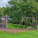 Slide mound and wooden play frame at Princes Park, Liverpool Slide mound and wooden play frame at Princes Park, Liverpool