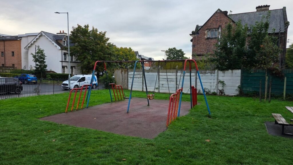 Swings at Aigburth Vale Play Area, Aigburth, Liverpool Swings at Aigburth Vale Play Area, Aigburth, Liverpool