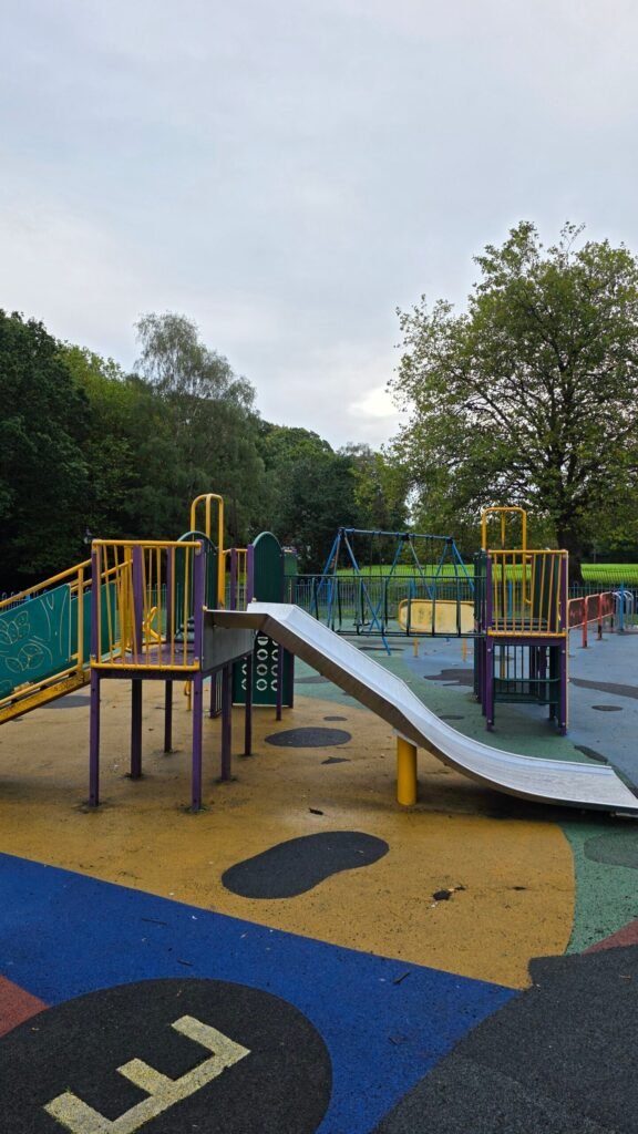 Toddler play unit and slide at Sefton Park Playground Toddler play unit and slide at Sefton Park Playground